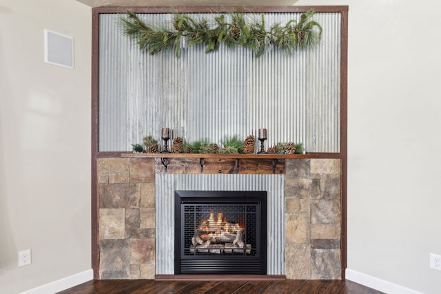 details featuring wood-type flooring and a fireplace