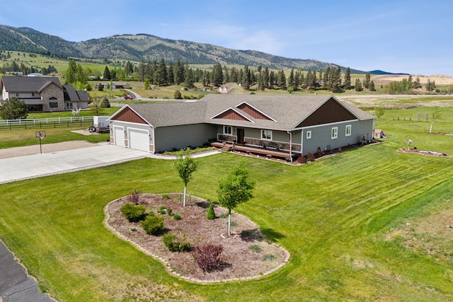 bird's eye view featuring a mountain view and a rural view