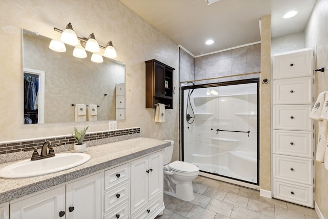 bathroom featuring walk in shower, tile patterned floors, toilet, decorative backsplash, and vanity