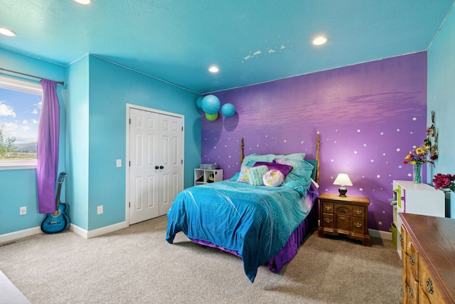 carpeted bedroom with a closet