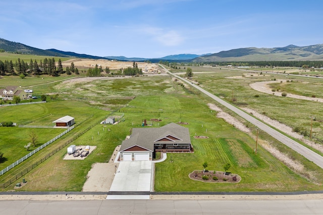 aerial view with a mountain view and a rural view