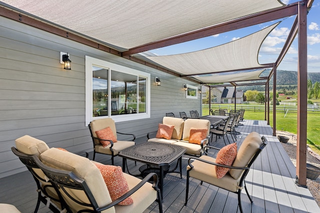 wooden deck featuring outdoor lounge area