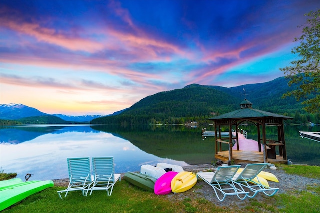 dock area with a water and mountain view