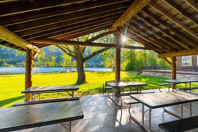 view of patio featuring a water view