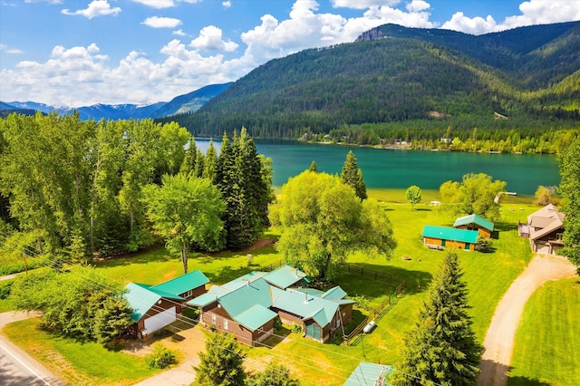 birds eye view of property featuring a water and mountain view