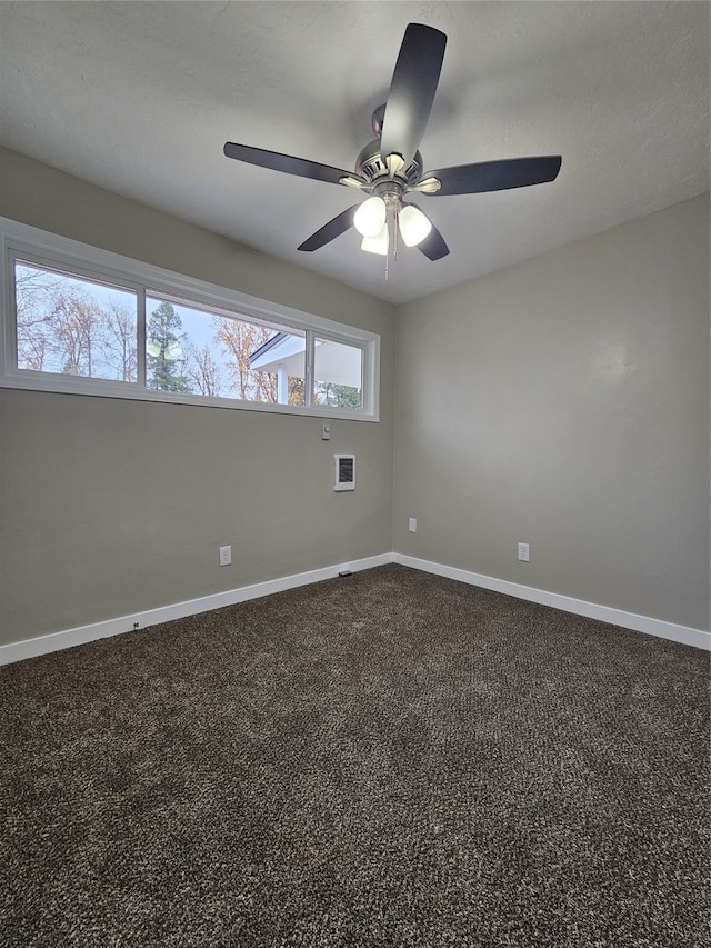 unfurnished room with carpet and ceiling fan