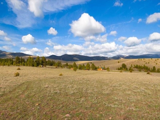 view of mountain feature featuring a rural view