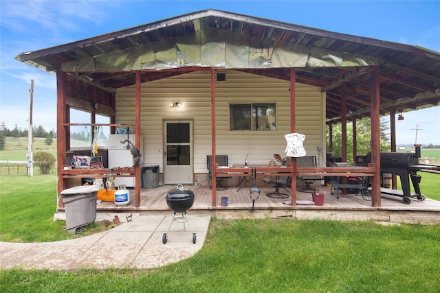 exterior space featuring a deck and a yard