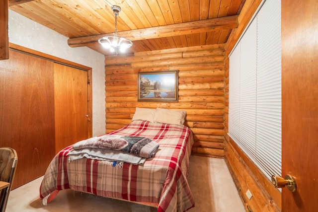 bedroom with beam ceiling, rustic walls, wooden ceiling, an inviting chandelier, and a closet