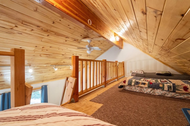 unfurnished bedroom featuring vaulted ceiling, ceiling fan, and wooden ceiling