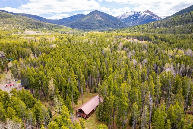 mountain view with a wooded view
