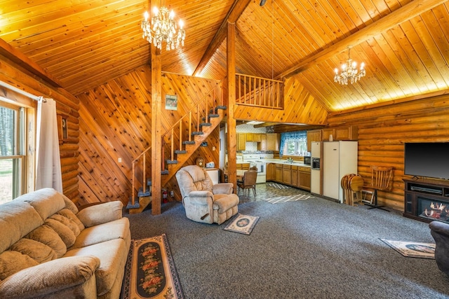 living room with beamed ceiling, a notable chandelier, high vaulted ceiling, and log walls