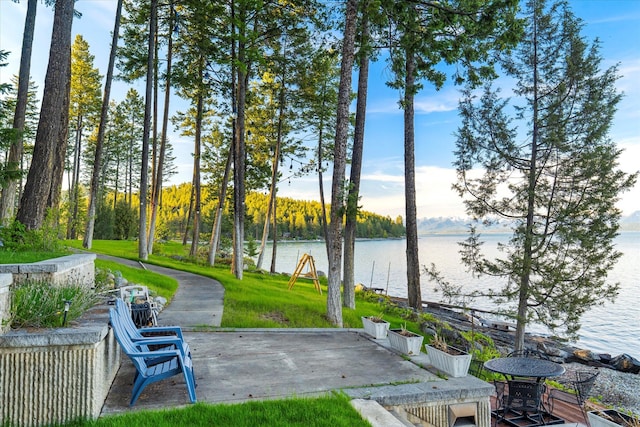 view of patio / terrace with a water view