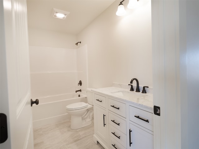 full bathroom featuring bathing tub / shower combination, vanity, and toilet