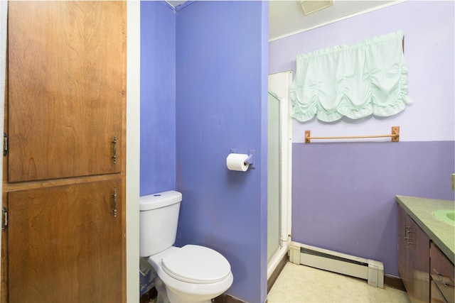 bathroom with baseboard heating, vanity, and toilet