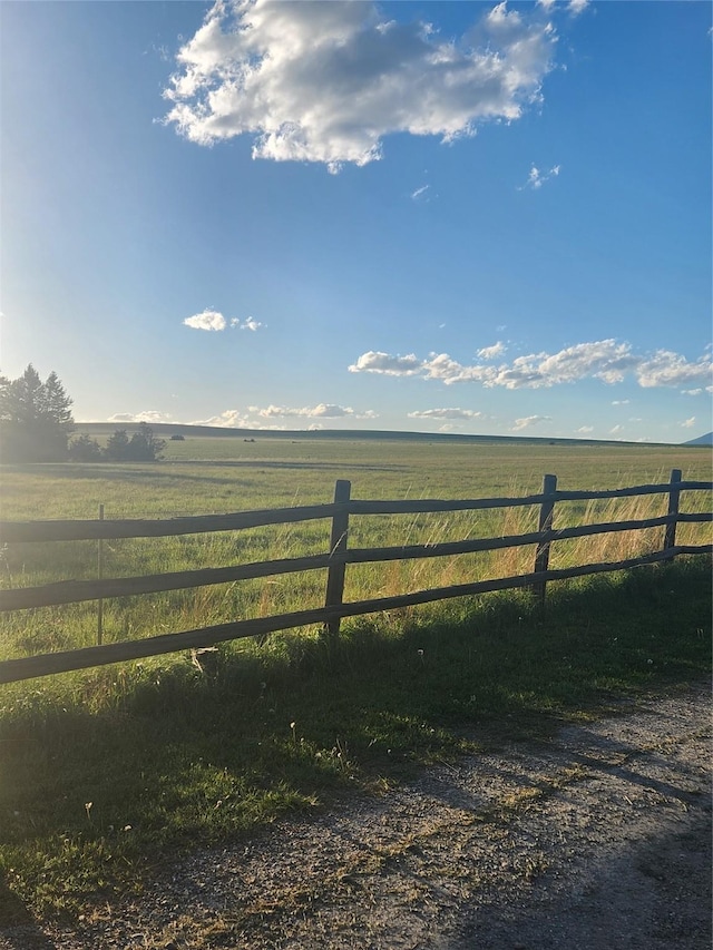 view of gate featuring a rural view