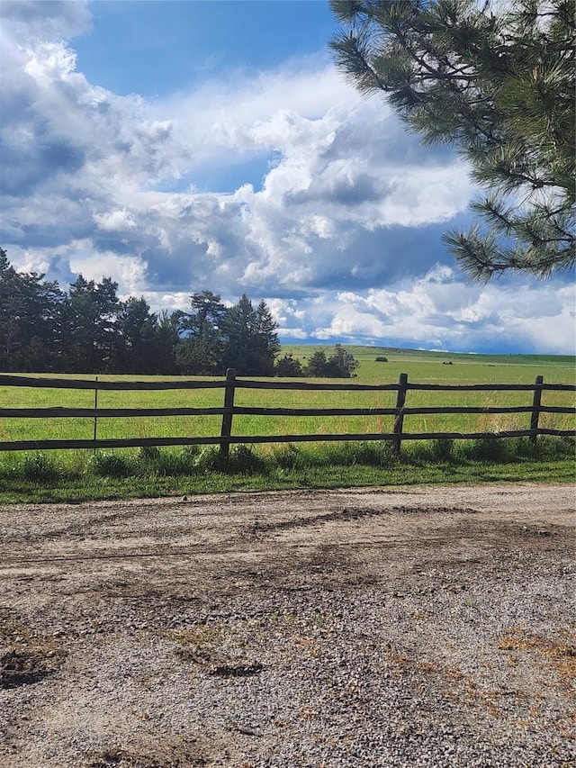 view of gate featuring a rural view