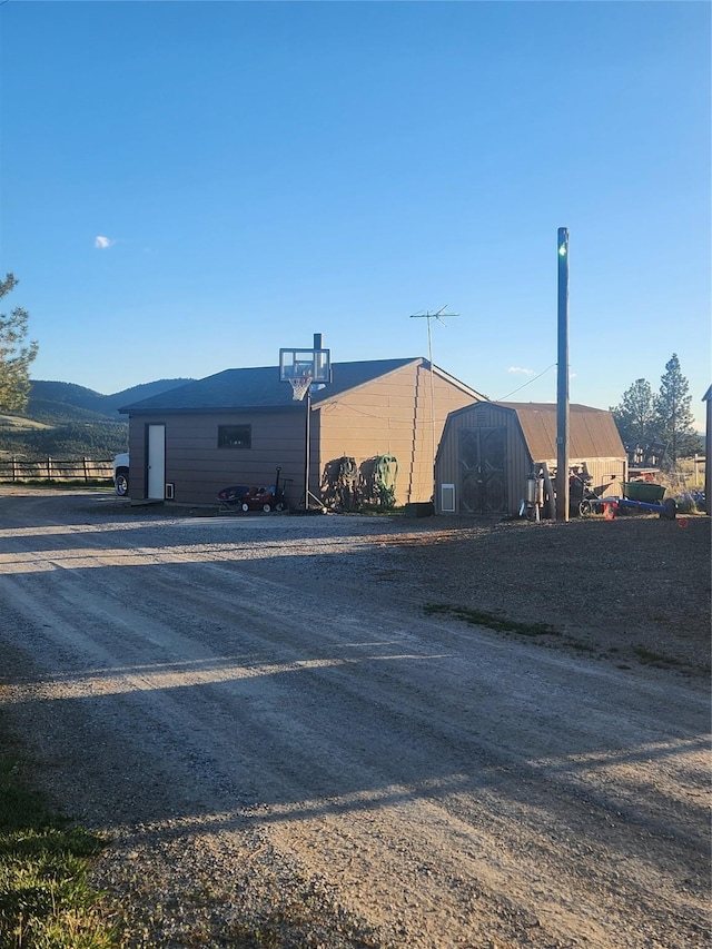 59 N Fork Rd, Townsend, MT 59644 - view of building exterior featuring a mountain view