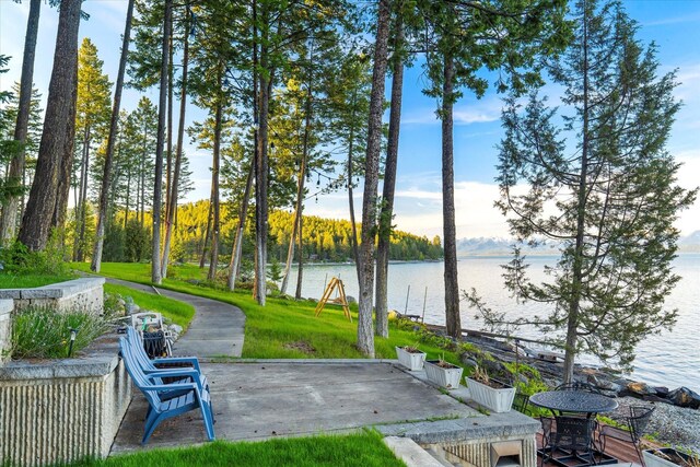 18643 Goose Bay Rd, Lakeside, MT 59922 - view of community featuring a water view and a patio area