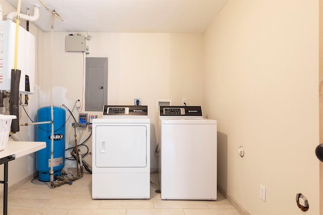 washroom with separate washer and dryer and electric panel