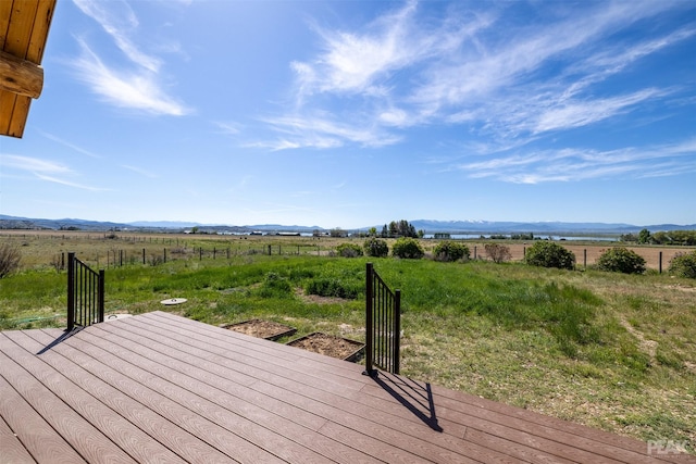 wooden terrace with a rural view