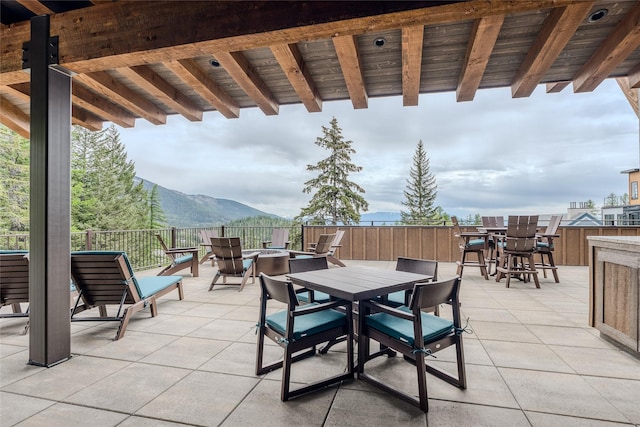 view of patio / terrace featuring a mountain view