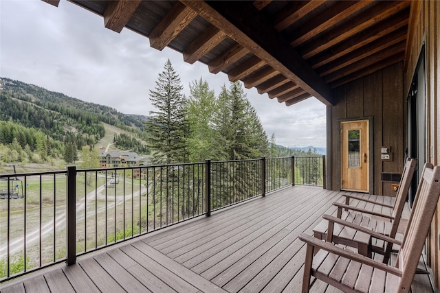 wooden terrace with a mountain view