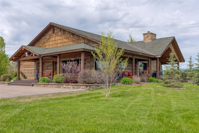 view of front of house featuring a front lawn and a porch