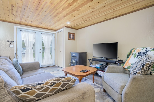 living room with wood ceiling, crown molding, and french doors