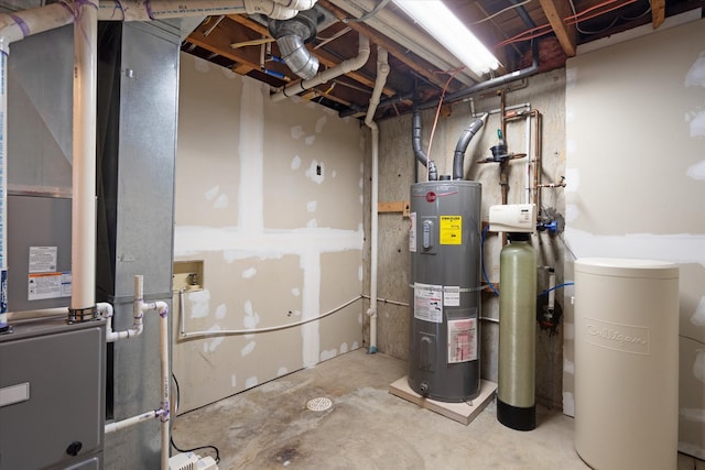 utility room featuring heating unit and water heater