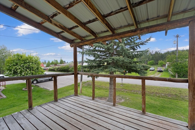 deck featuring a lawn