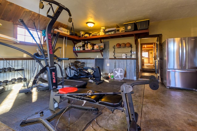 workout room with concrete floors