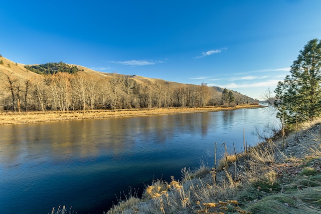 property view of water featuring a mountain view