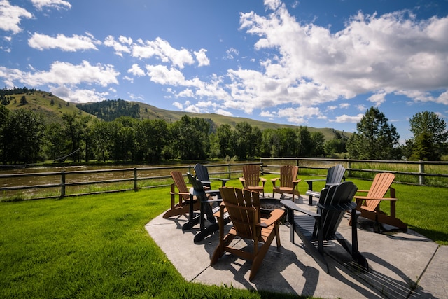 view of terrace with a mountain view