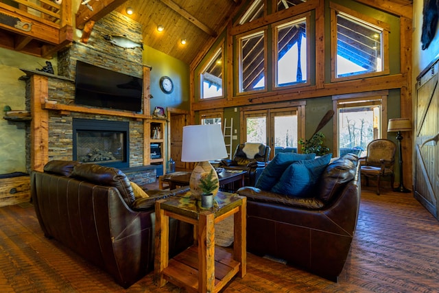 living room with hardwood / wood-style floors, beamed ceiling, a fireplace, wood ceiling, and high vaulted ceiling