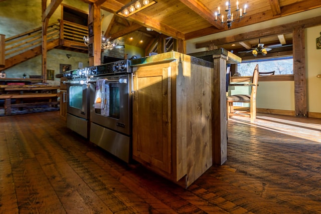 kitchen with ceiling fan with notable chandelier, dark hardwood / wood-style flooring, and lofted ceiling with beams