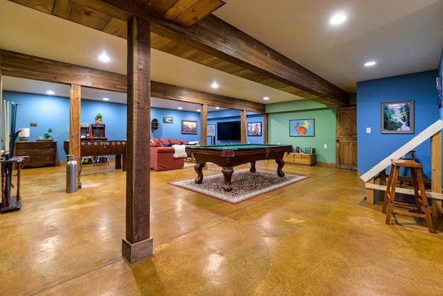 playroom featuring beamed ceiling, concrete flooring, and pool table