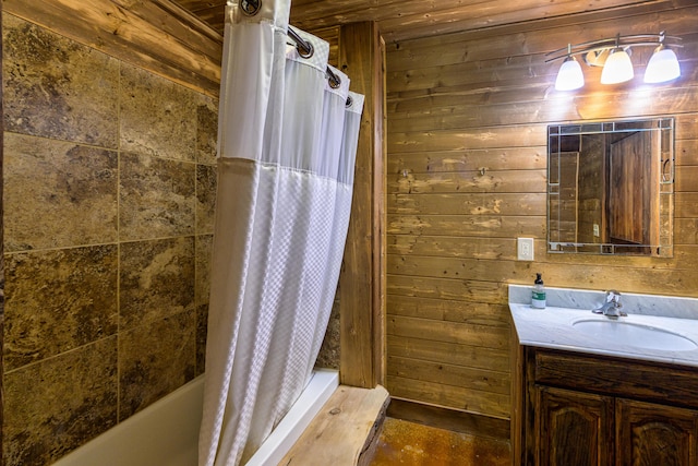 bathroom with wooden ceiling, vanity, and wood walls