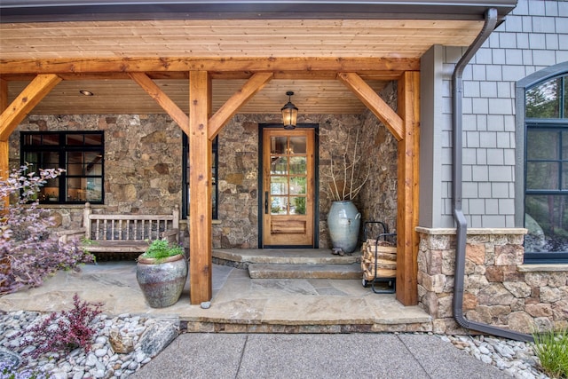 doorway to property with covered porch