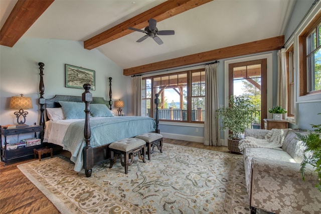 bedroom with hardwood / wood-style flooring, ceiling fan, multiple windows, and vaulted ceiling with beams