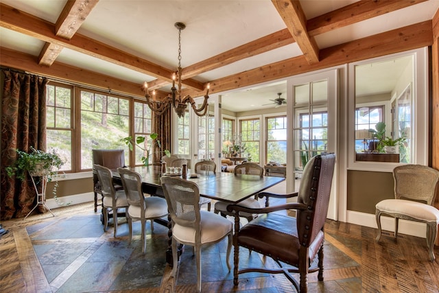 dining area with a notable chandelier and beamed ceiling