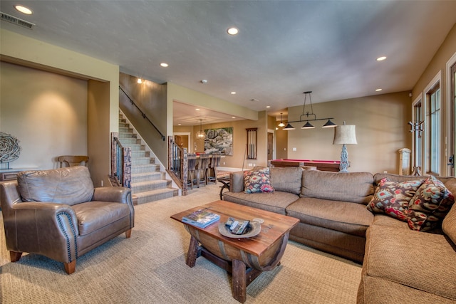 carpeted living room with billiards