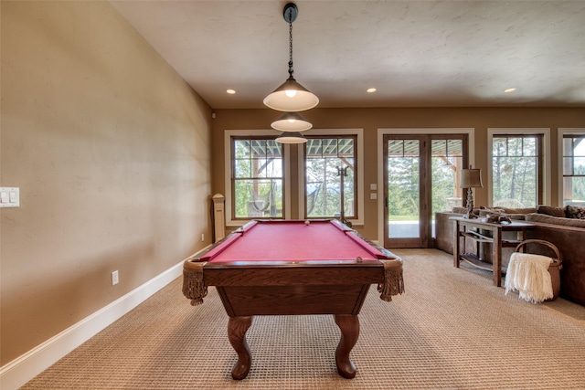 recreation room featuring pool table and light carpet