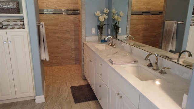 38648 Masumola Rd, Polson, MT 59860 - full bath with double vanity, tiled shower, and a sink