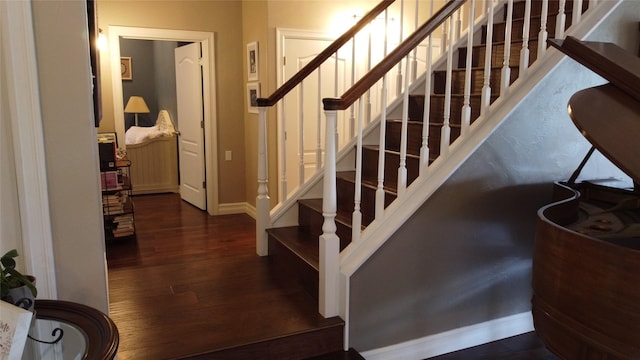 38648 Masumola Rd, Polson, MT 59860 - stairs featuring baseboards and wood finished floors