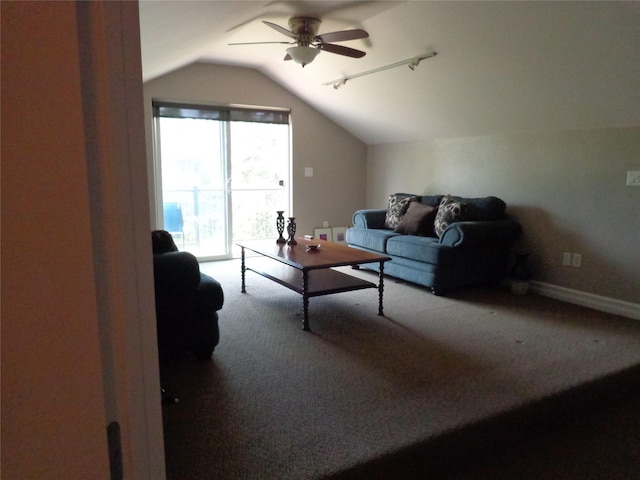 38648 Masumola Rd, Polson, MT 59860 - living area featuring carpet, baseboards, rail lighting, a ceiling fan, and lofted ceiling