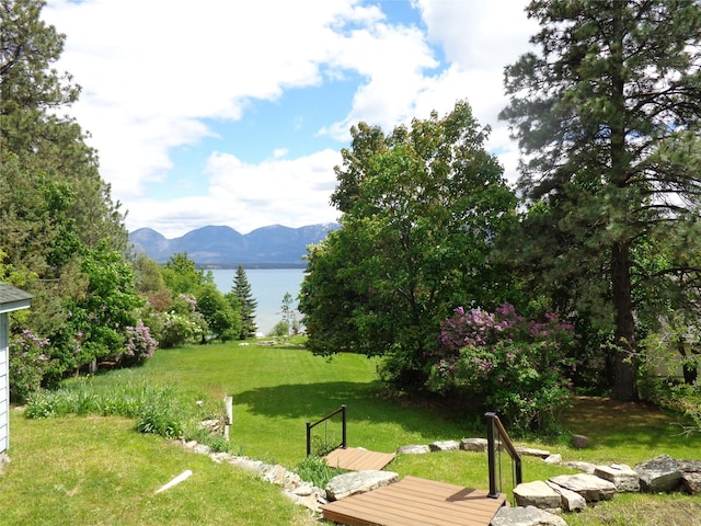 38648 Masumola Rd, Polson, MT 59860 - view of home's community featuring a water and mountain view and a yard
