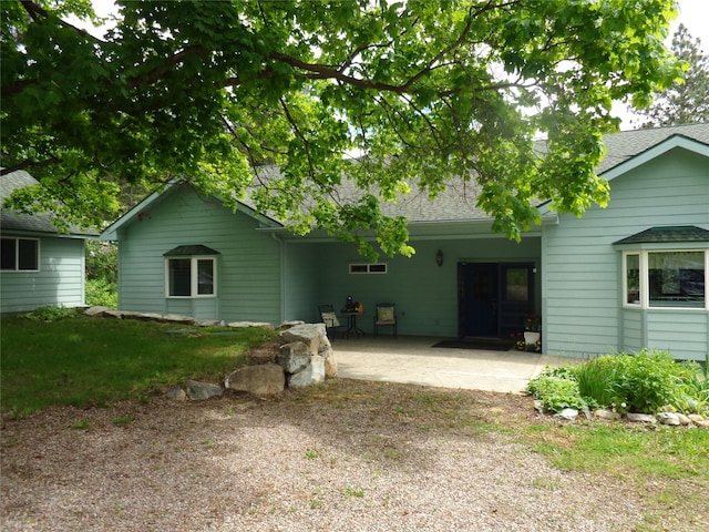 38648 Masumola Rd, Polson, MT 59860 - rear view of house with roof with shingles