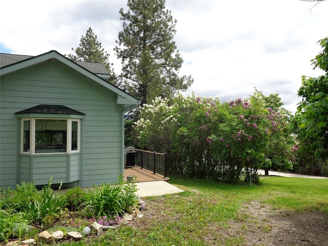 38648 Masumola Rd, Polson, MT 59860 - view of yard featuring a wooden deck