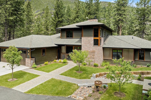 prairie-style house with a front yard